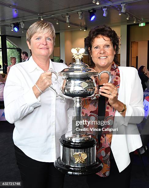 Hana Mandlikova and Evonne Goolagong Cawley pose with the Daphne Akhurst Memorial Cup during the Celebration of Inspirational Women brunch during day...