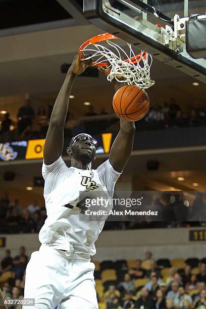 Tacko Fall of the UCF Knights slam dunks the ball during an NCAA basketball game against the SMU Mustangs at the CFE Arena on January 25, 2017 in...