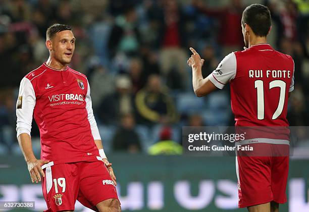 Braga's Serbian forward Nikola Stojiljkovic celebrates with teammate SC Braga's Portuguese forward Rui Fonte after scoring a goal during Portuguese...