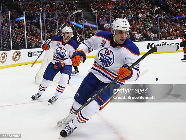 Anton Slepyshev and Milan Lucic of the Edmonton Oilers celebrate a second period goal by Lucic against the Anaheim Ducks at the Honda Center on...