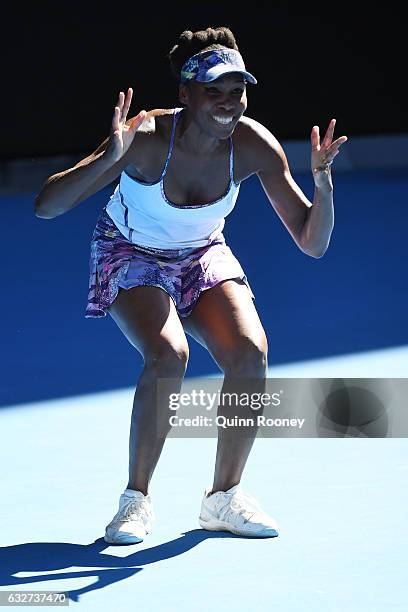 Venus Williams of the United States celebrates winning match point in her semifinal match against CoCo Vandeweghe of the United States on day 11 of...