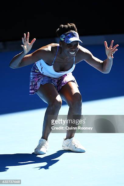 Venus Williams of the United States celebrates winning match point in her semifinal match against CoCo Vandeweghe of the United States on day 11 of...