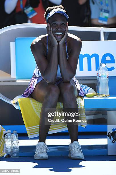 Venus Williams of the United States celebrates winning match point in her semifinal match against CoCo Vandeweghe of the United States on day 11 of...