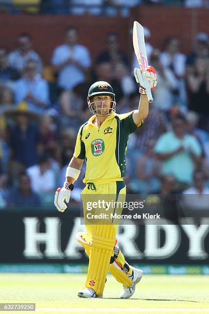 David Warner of Australia celebrates after reaching 150 runs during game five of the One Day International series between Australia and Pakistan at...