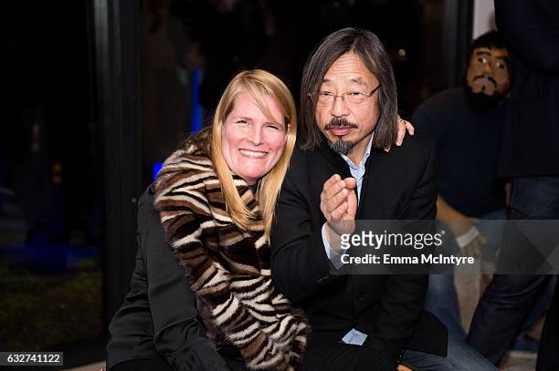 Katie De Tilly and artist Huang Rui attend 'Art Los Angeles Contemporary host committee members and collectors Joel Lubin and wife Marija Karan host...