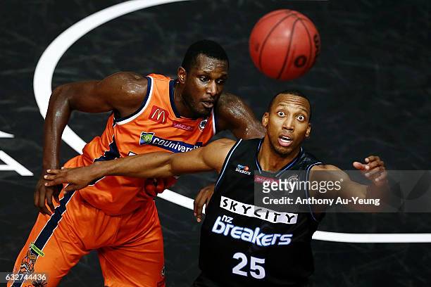Akil Mitchell of the Breakers looks to catch a pass against Nnanna Egwu of the Taipans during the round 17 NBL match between the New Zealand Breakers...