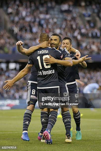 James Troisi of the Victory celebrates a goal with team mates during the round 17 A-League match between the Melbourne Victory and Sydney FC at...