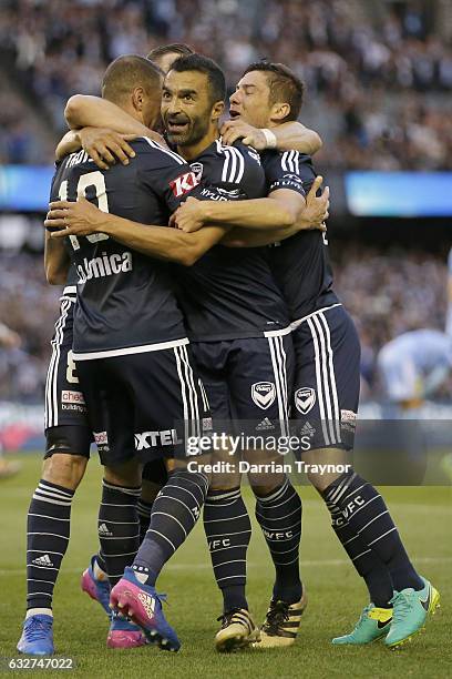 James Troisi of the Victory celebrates a goal with team mates during the round 17 A-League match between the Melbourne Victory and Sydney FC at...