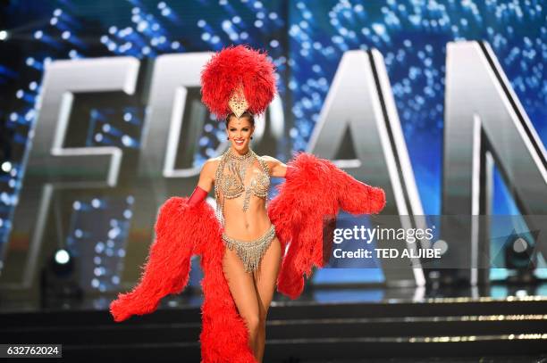 Miss Universe contestant Iris Mittenaere of France presents during the national costume and preliminary competition of the Miss Universe pageant at...