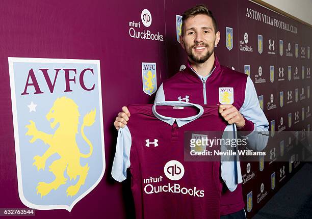 New signing Conor Hourihane of Aston Villa poses for a picture at the club's training ground at Bodymoor Heath on January 26, 2017 in Birmingham,...