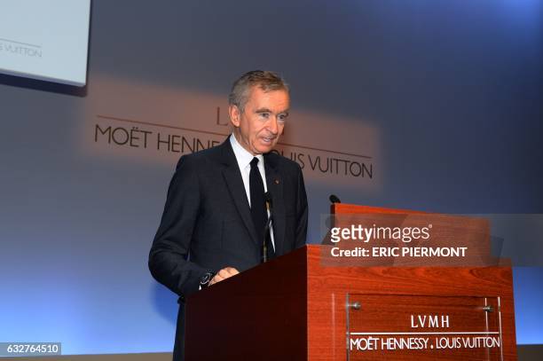 French luxury group LVMH Chairman and Chief Executive Officer Bernard Arnault presents the 2016 full year results at the LVMH headquarters in Paris,...