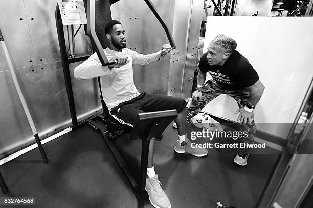 Will Barton of the Denver Nuggets works out with Steve Hess before the game against the Utah Jazz on January 24, 2017 at the Pepsi Center in Denver,...