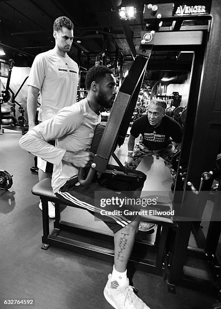 Will Barton of the Denver Nuggets works out with Steve Hess before the game against the Utah Jazz on January 24, 2017 at the Pepsi Center in Denver,...
