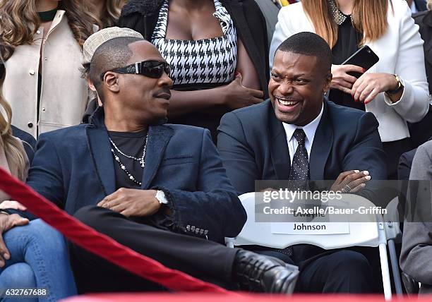 Actors Eddie Murphy and Chris Tucker attend the ceremony honoring Brett Ratner with a Star on the Hollywood Walk of Fame on January 19, 2017 in...
