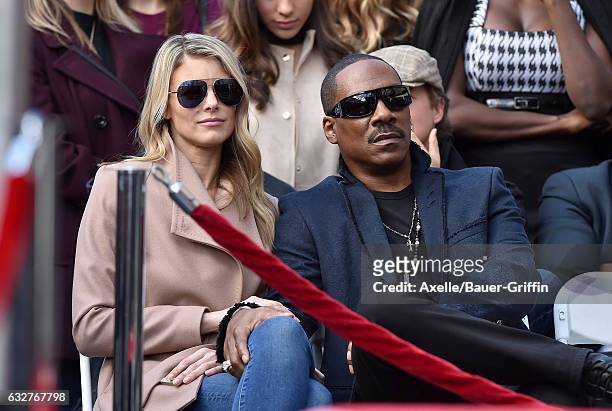 Actor Eddie Murphy and wife Paige Butcher attend the ceremony honoring Brett Ratner with a Star on the Hollywood Walk of Fame on January 19, 2017 in...