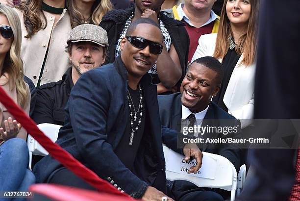 Actors Eddie Murphy and Chris Tucker attend the ceremony honoring Brett Ratner with a Star on the Hollywood Walk of Fame on January 19, 2017 in...