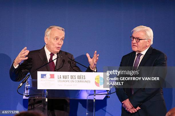 French Foreign Minister Jean-Marc Ayrault delivers a speech next to German Foreign Minister Frank-Walter Steinmeier during the launch of the second...