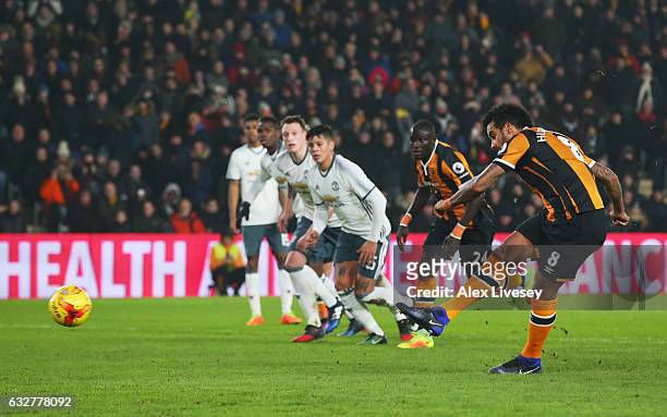 Tom Huddlestone of Hull City scores their first goal from the penalty spot during the EFL Cup Semi-Final second leg match between Hull City and...
