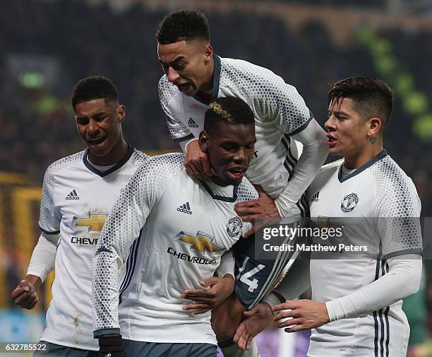 Paul Pogba of Manchester United celebrates scoring their first goal during the EFL Cup Semi-Final second leg match between Hull City and Manchester...