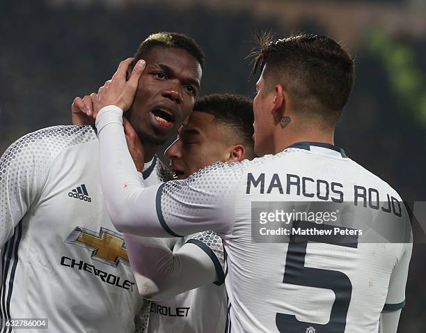 Paul Pogba of Manchester United celebrates scoring their first goal during the EFL Cup Semi-Final second leg match between Hull City and Manchester...