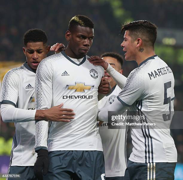 Paul Pogba of Manchester United celebrates scoring their first goal during the EFL Cup Semi-Final second leg match between Hull City and Manchester...