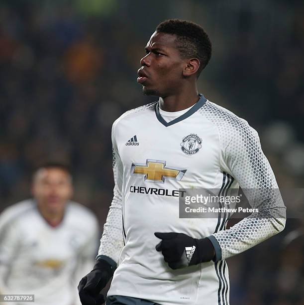 Paul Pogba of Manchester United celebrates scoring their first goal during the EFL Cup Semi-Final second leg match between Hull City and Manchester...