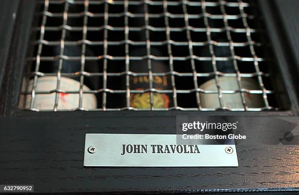John Travolta's personal wine locker at Strega Prime restaurant in Woburn, MA is pictured on Feb. 26, 2016.