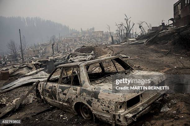 View of the town of Santa Olga, which was destroyed by a forest fire, 330 km south of Santiago, on January 26, 2017. Six people -- among them four...