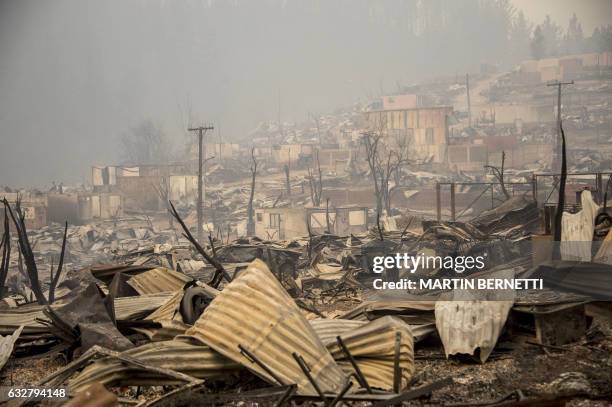 View of the town of Santa Olga, which was destroyed by a forest fire, 330 km south of Santiago, on January 26, 2017. Six people -- among them four...