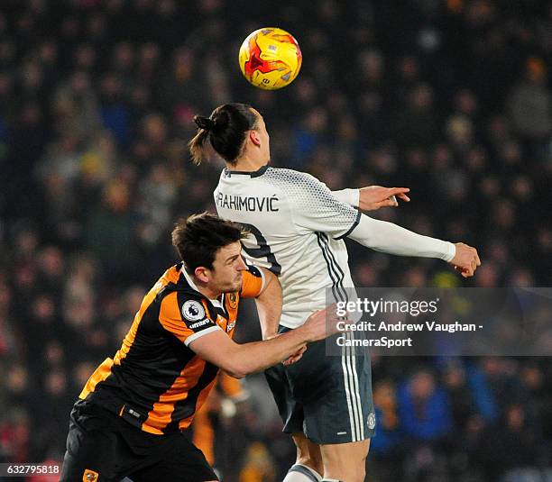Hull City's Harry Maguire vies for possession with Manchester United's Zlatan Ibrahimovic during the EFL Cup Semi-Final Second Leg match between Hull...