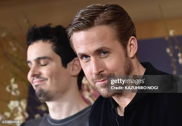 Canadian actor Ryan Gosling and US film director Damien Chazelle pose during a photo session following a press conference for their film "La La Land"...