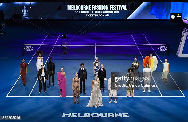 Models showcase Australia's most celebrated designers as they parade on Rod Laver Arena during day twelve of the 2017 Australian Open at Melbourne...