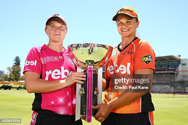 Alyssa Healy of the Sixers and Suzie Bates of the Scorchers pose with the WBBL trophy during a Big Bash League media opportunity at WACA on January...