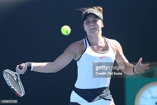 Bianca Vanessa Andreescu of Canada plays a backhand in her junior girls semifinal match against Rebeka Masarova of Switzerland during the Australian...