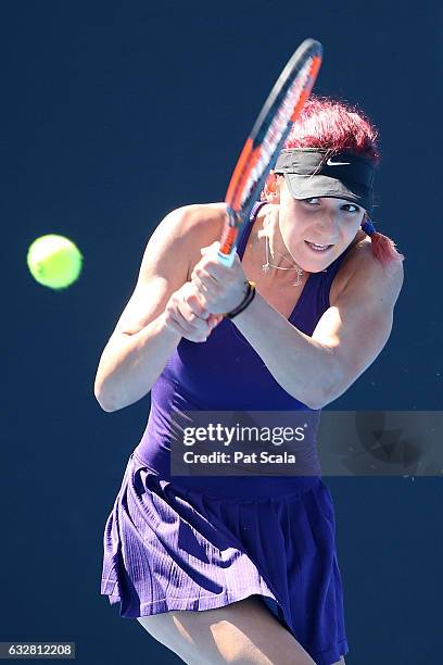 Rebeka Masarova of Switzerland plays a backhand in her junior girls semifinal match against Bianca Vanessa Andreescu of Canada during the Australian...