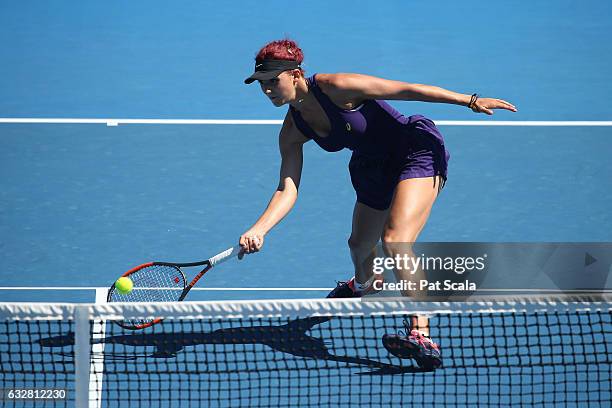 Rebeka Masarova of Switzerland plays a forekhand in her junior girls semifinal match against Bianca Vanessa Andreescu of Canada during the Australian...