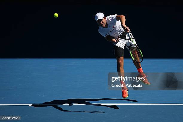 Yshai Oliel of Israel plays a shot in his junior boys semefinal match against Yibing Wu of China during the Australian Open 2017 Junior Championships...