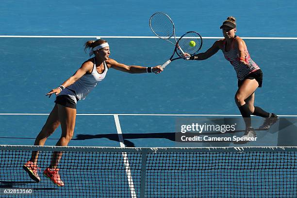 Bethanie Mattek-Sands of the United States and Lucie Safarova of the Czech Republic compete in their Women's Doubles Final match against Andrea...