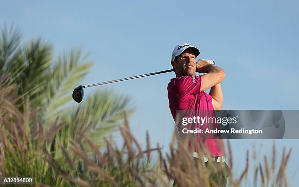 Bradley Dredge of Wales hits his tee-shot on the 16th hole during the second round of the Commercial Bank Qatar Masters at Doha Golf Club on January...