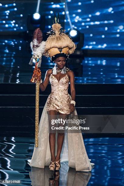 Miss Sierra Leone shows off her national costume at the Arena in Pasay City. Candidates from different countries showed off their national costumes...