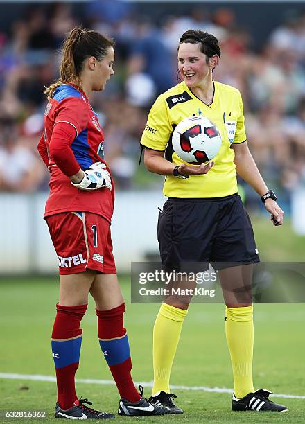 Referee Kate Jacewicz speaks to Jets goalkeeper Katelyn Rowland during the round 14 W-League match between the Newcastle Jets and Melbourne City FC...