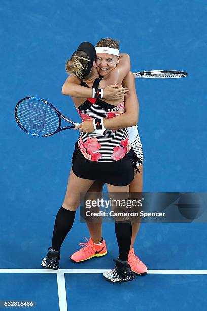 Bethanie Mattek-Sands of the United States and Lucie Safarova of the Czech Republic celebrate championship point in their Women's Doubles Final match...