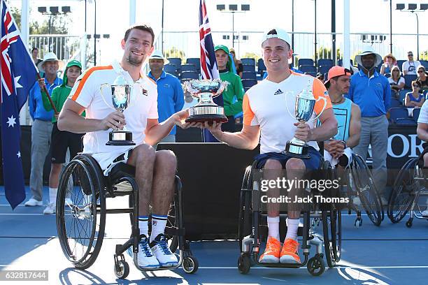 Joachim Gerard of Belgium and Gordon Reid of Great Britain pose with their trophies after winning their Men's Wheelchair Doubles Final against...