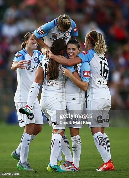 Amy Jackson of Melbourne City celebrates with team mates after scoring a goal during the round 14 W-League match between the Newcastle Jets and...