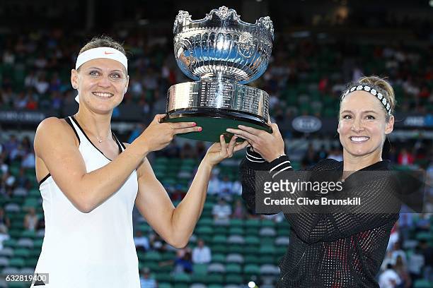 Bethanie Mattek-Sands of the United States and Lucie Safarova of the Czech Republic pose with the trophy after winning their Women's Doubles Final...