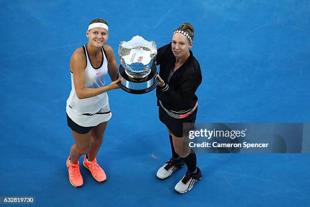 Bethanie Mattek-Sands of the United States and Lucie Safarova of the Czech Republic pose with the trophy after winning their Women's Doubles Final...