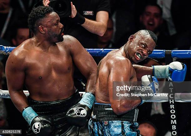 Manchester , United Kingdom - 10 December 2016; Dillan Whyte, right, exchanges punches with Dereck Chisora during their WBC World Heavyweight Title...