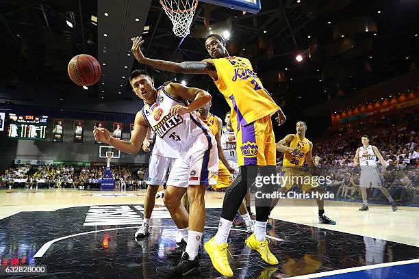 Reuben Te Rangi of the Bullets and Greg Whittington of the Kings compete for the ball during the round 17 NBL match between the Brisbane Bullets and...