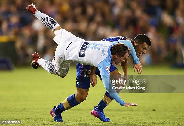 Neil Kilkenny of Melbourne City clashes with Andrew Nabbout of the Jets during the round 17 A-League match between the Newcastle Jets and Melbourne...