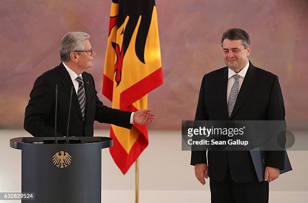 German President Joachim Gauck gestures while appointing Sigmar Gabriel as Germany's new foreign minister during a ceremony at Schloss Bellevue...